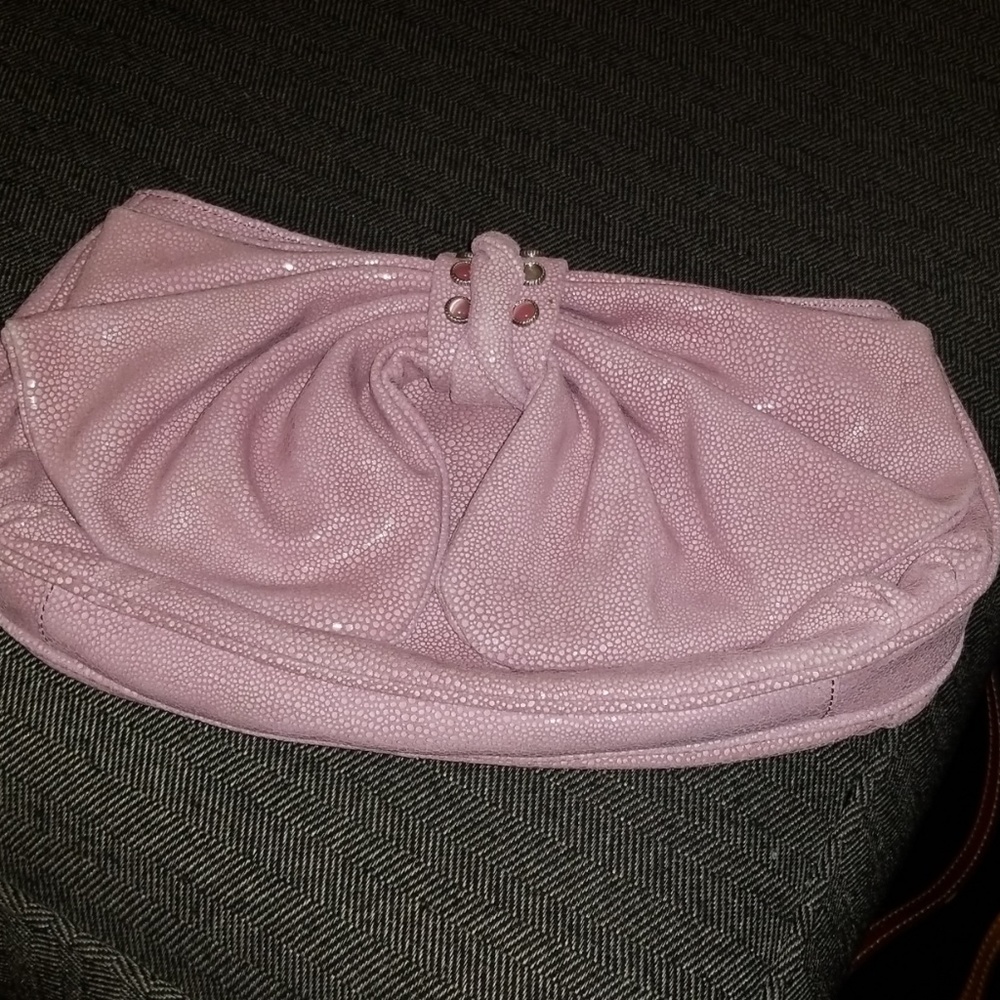 Pink leather clutch